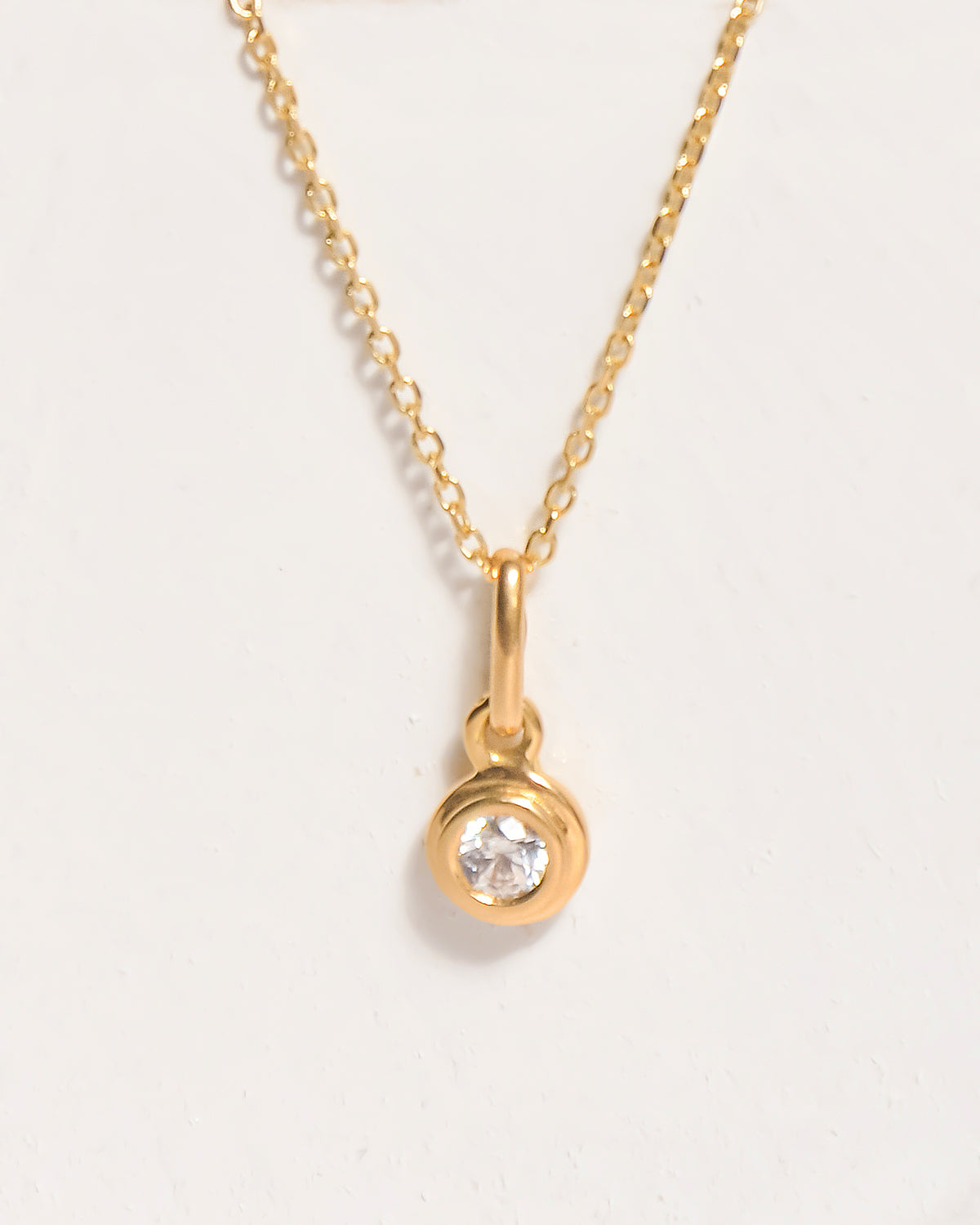 dije de oro, dije dorado, dije con piedra, dije con colgante de piedra