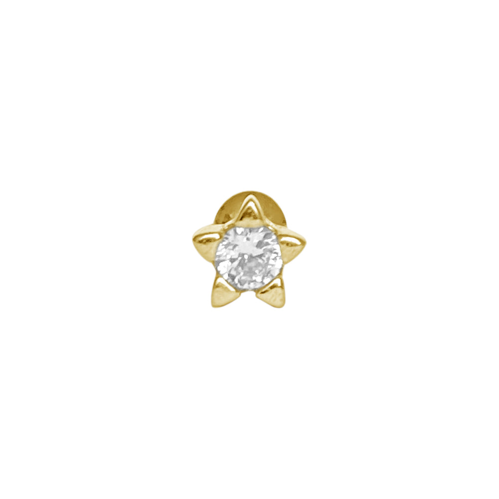 Piercing en forma de estrella dorada con piedra al centro 