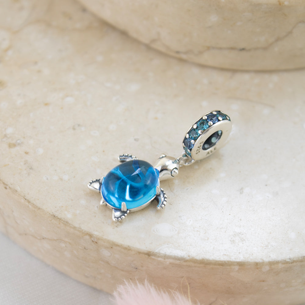 dije plateado, dije estilo pandora, dije de tortuga, dije de verano, dije con piedras azules